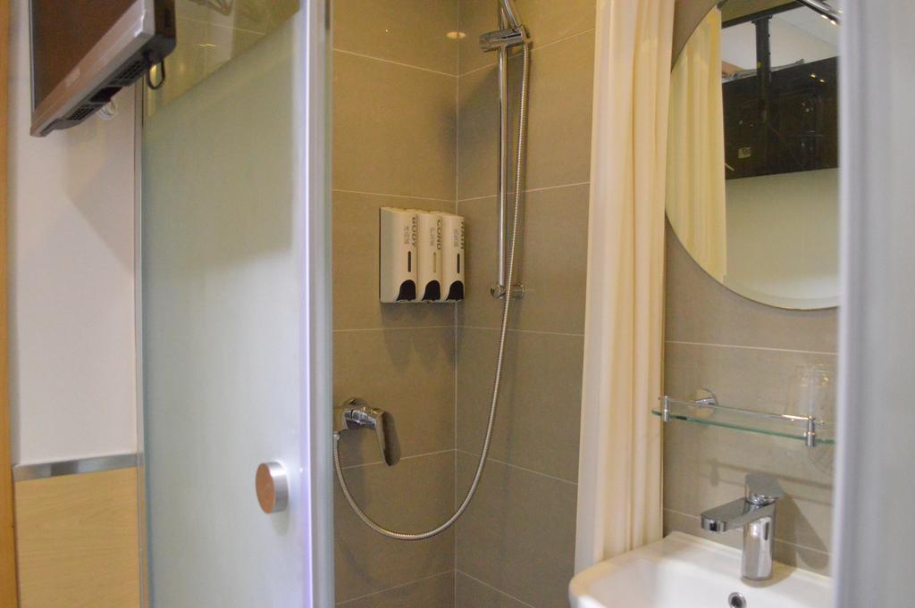 Modern Inn Гонконг Номер фото